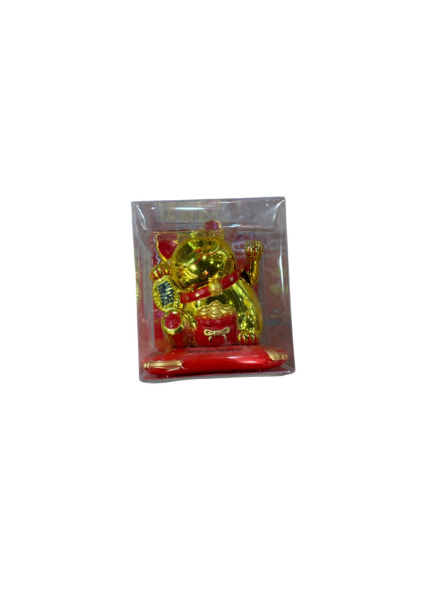 Chat chanceux japonais maneki neko doré alimenté par piles d'environ 10 cm de hauteur et 10 cm de largeur.